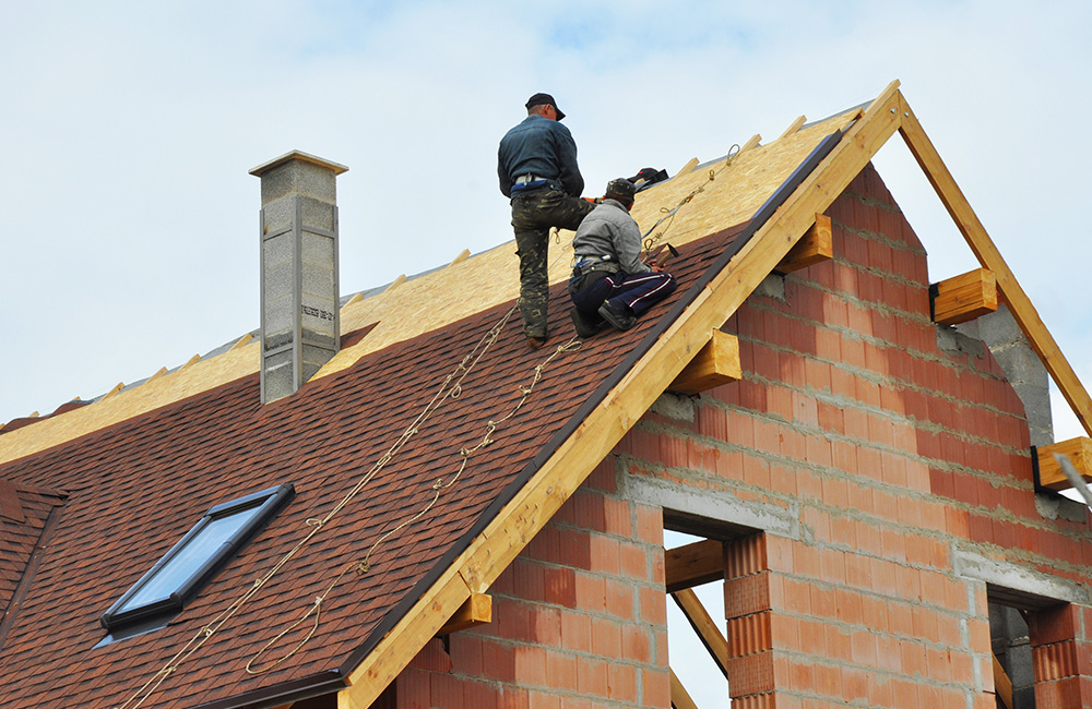 professional roofers doing a roof repair in Port Orchard's residential roofing